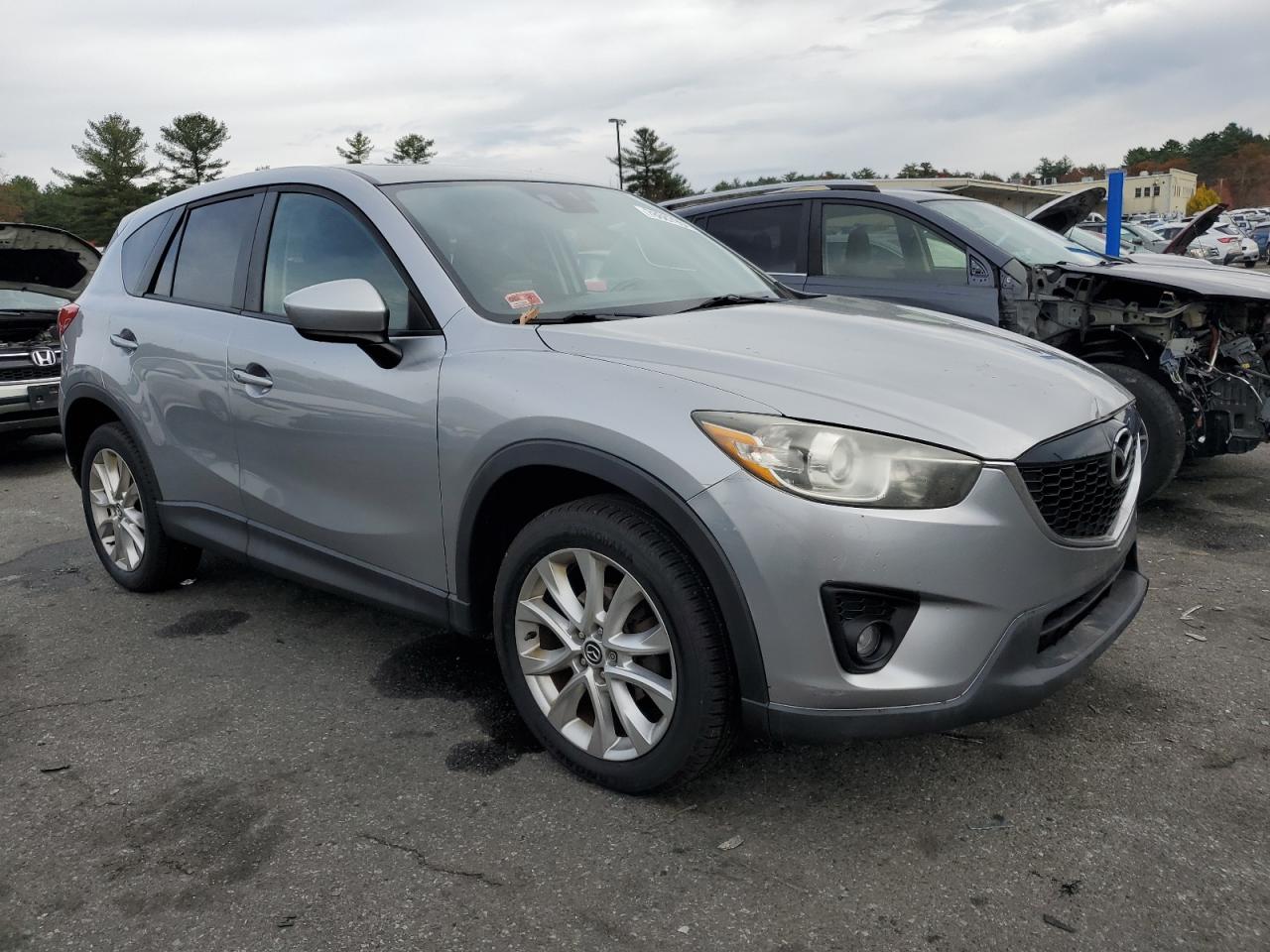 2014 Mazda CX-5 VIN JM3KE4DY9E0423840 Copart auction photo, normal wear / minor dent/scratches damage thumbnail 4