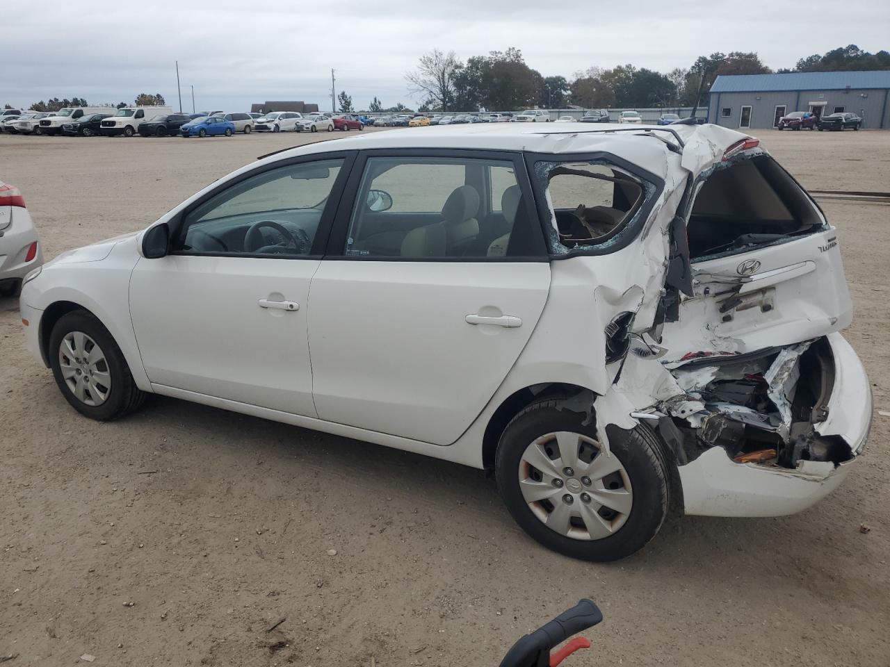 2011 Hyundai Elantra VIN KMHDB8AE9BU120102 Copart auction photo, rear end damage thumbnail 2