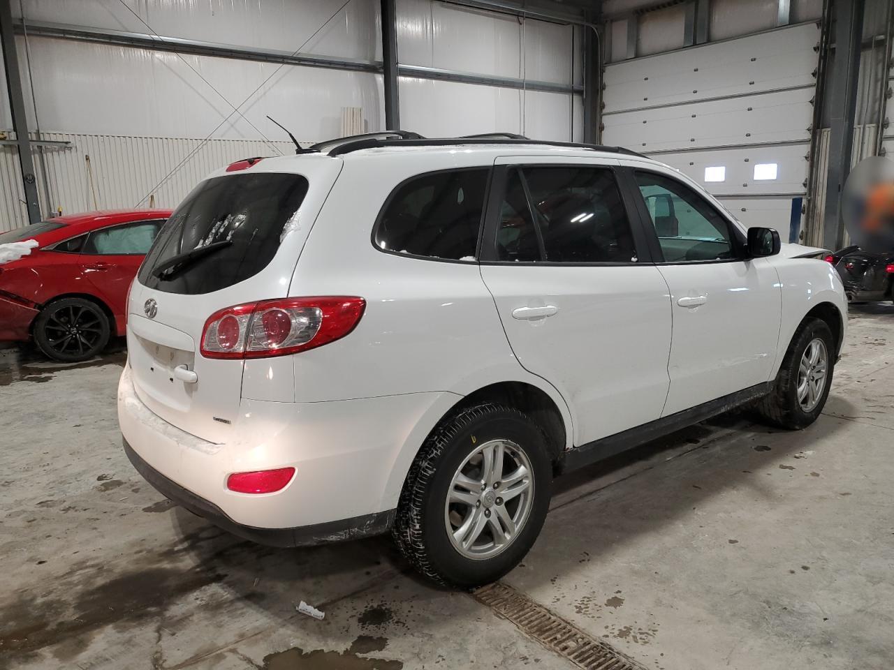 2012 Hyundai Santa Fe VIN 5XYZGDAB3CG141332 Copart auction photo, front end damage thumbnail 3