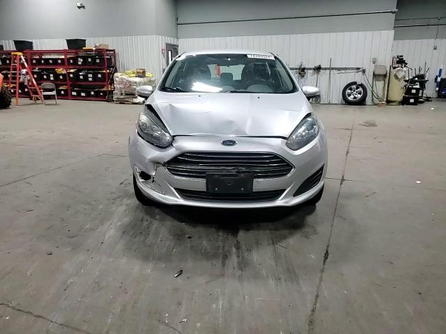 2016 Ford Fiesta VIN 3FADP4EJ2GM143339 Copart auction photo, all over damage thumbnail 11
