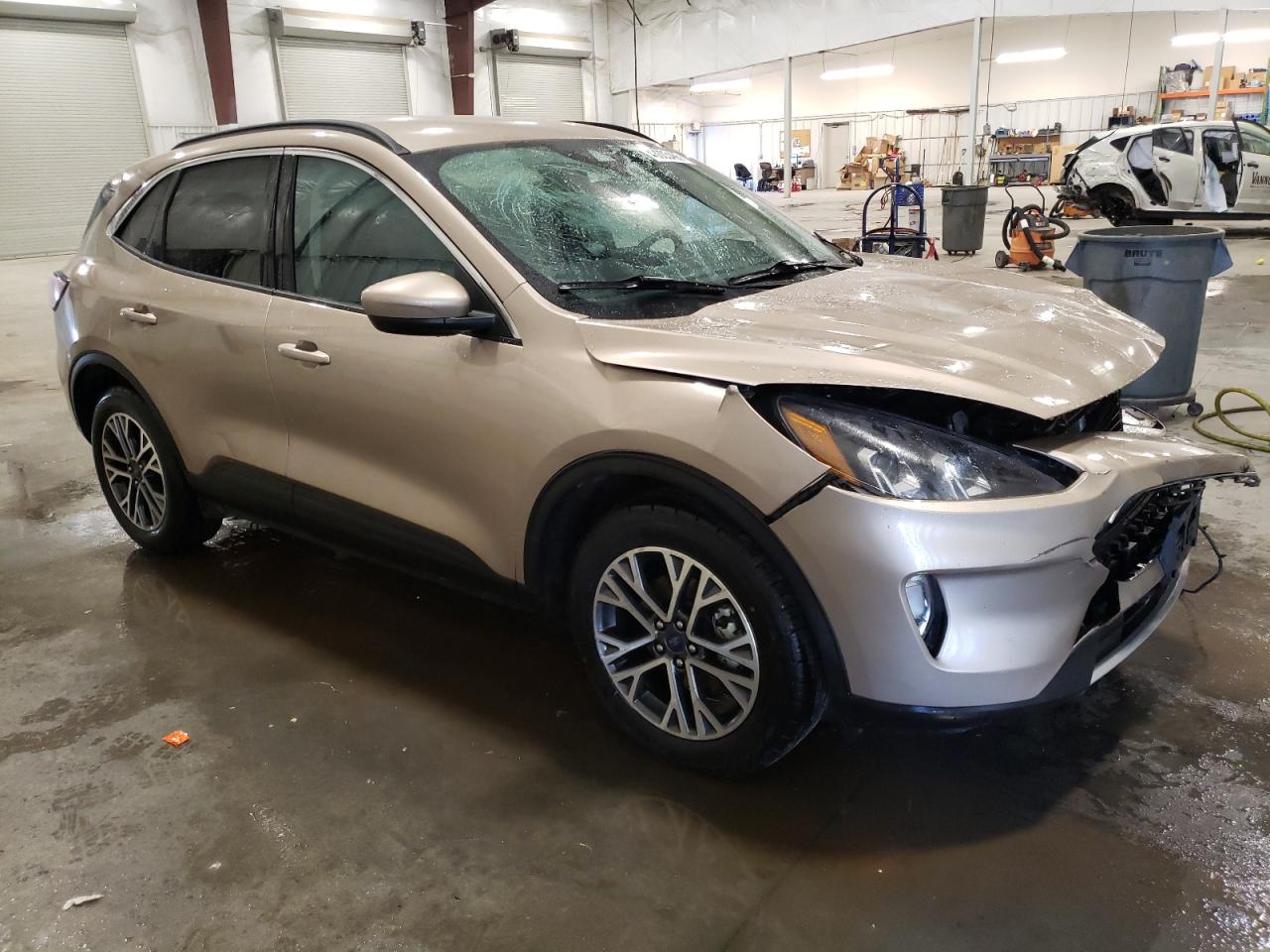 2020 Ford Escape VIN 1FMCU9H95LUC74666 Copart auction photo, front end / side damage thumbnail 4