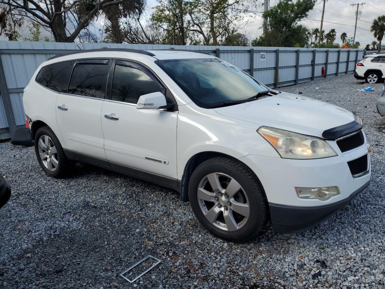 2009 Chevrolet Traverse VIN 1GNER23D59S174113 Copart auction photo, rear end damage thumbnail 4