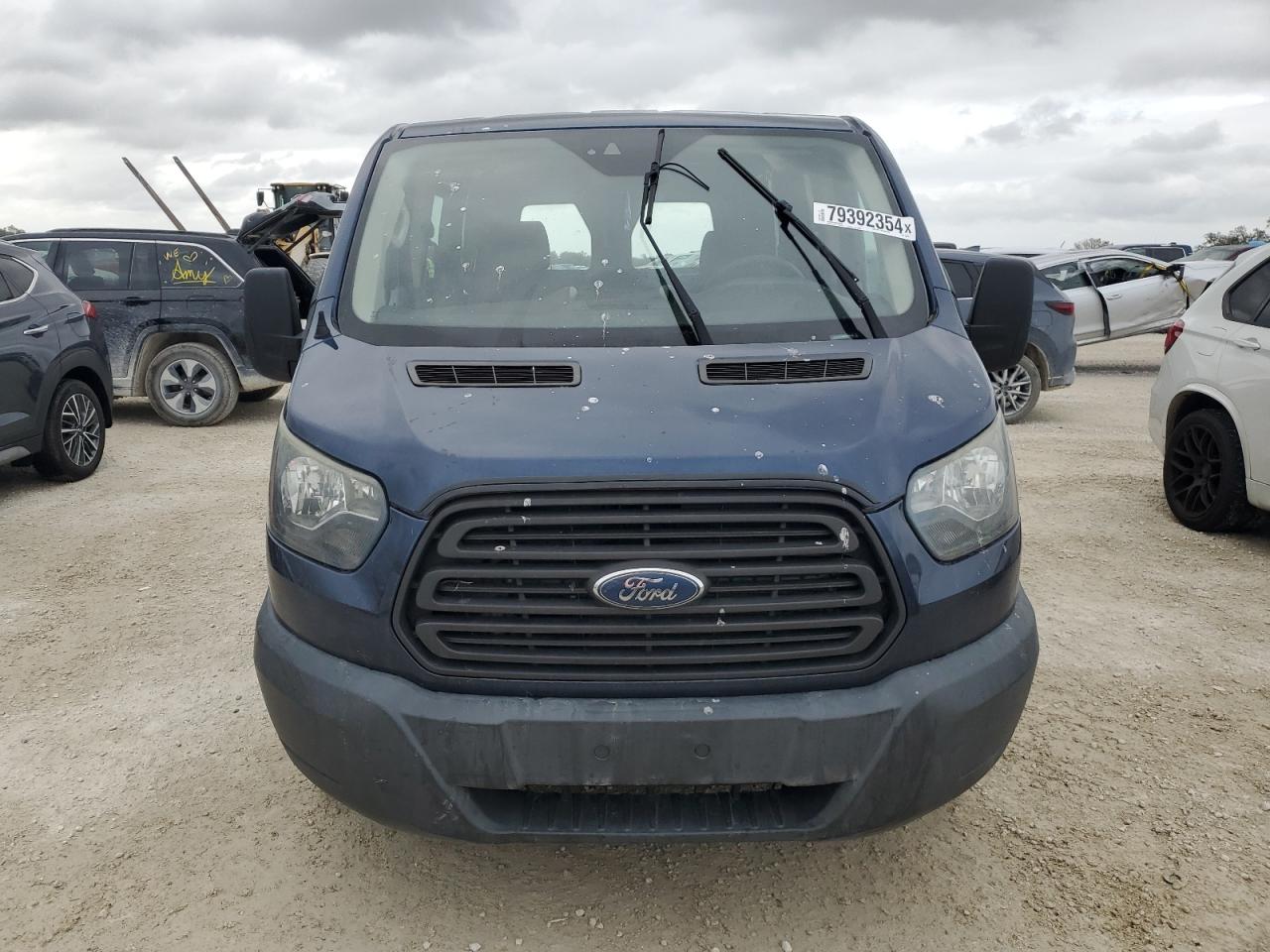 2016 Ford Transit VIN 1FTYR1YM8GKA05757 Copart auction photo, water/flood damage thumbnail 5
