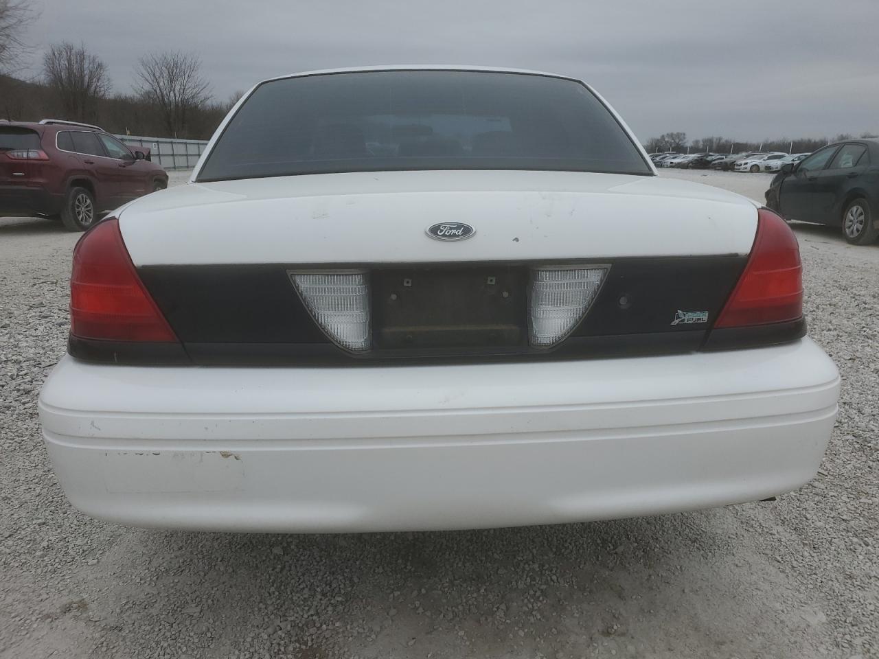 2010 Ford Crown Victoria VIN 2FABP7BV6AX125342 Copart auction photo, all over damage thumbnail 6