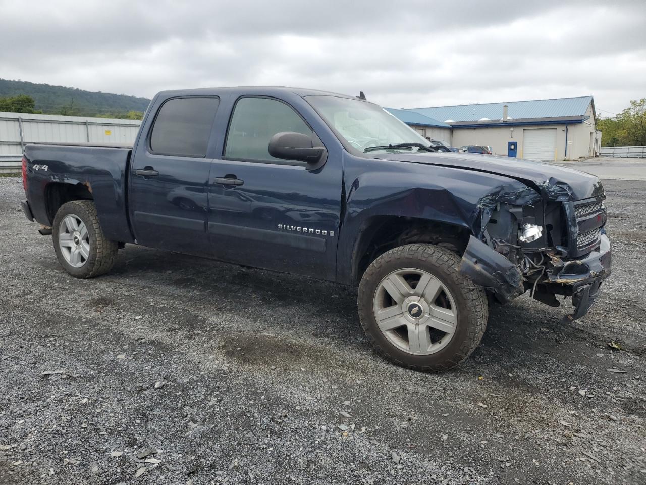 2007 Chevrolet Silverado VIN 2GCEK13M571571972 Copart auction photo, front end / side damage thumbnail 4