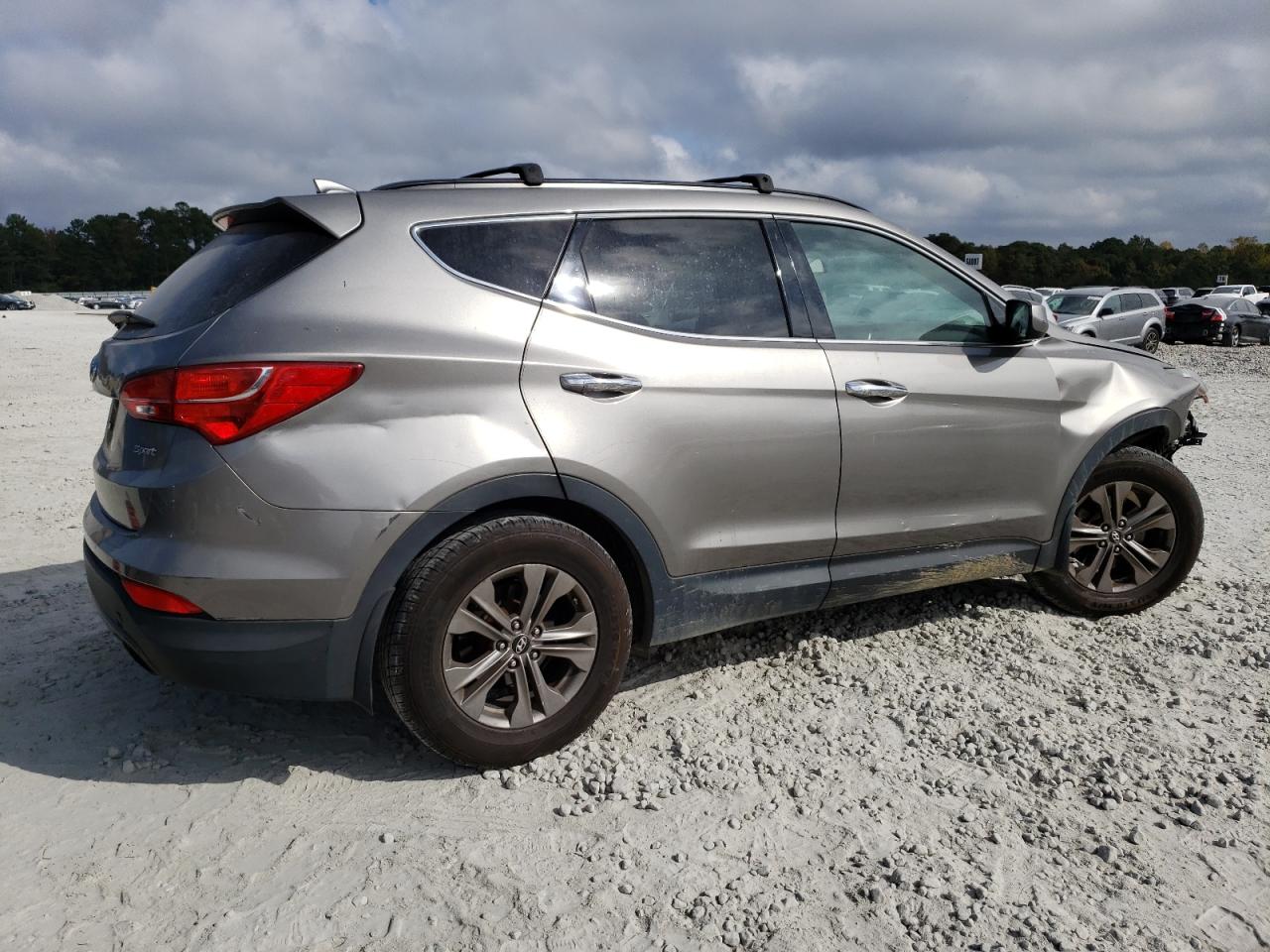 2015 Hyundai Santa Fe VIN 5XYZU3LBXFG239648 Copart auction photo, front end / rear end damage thumbnail 3