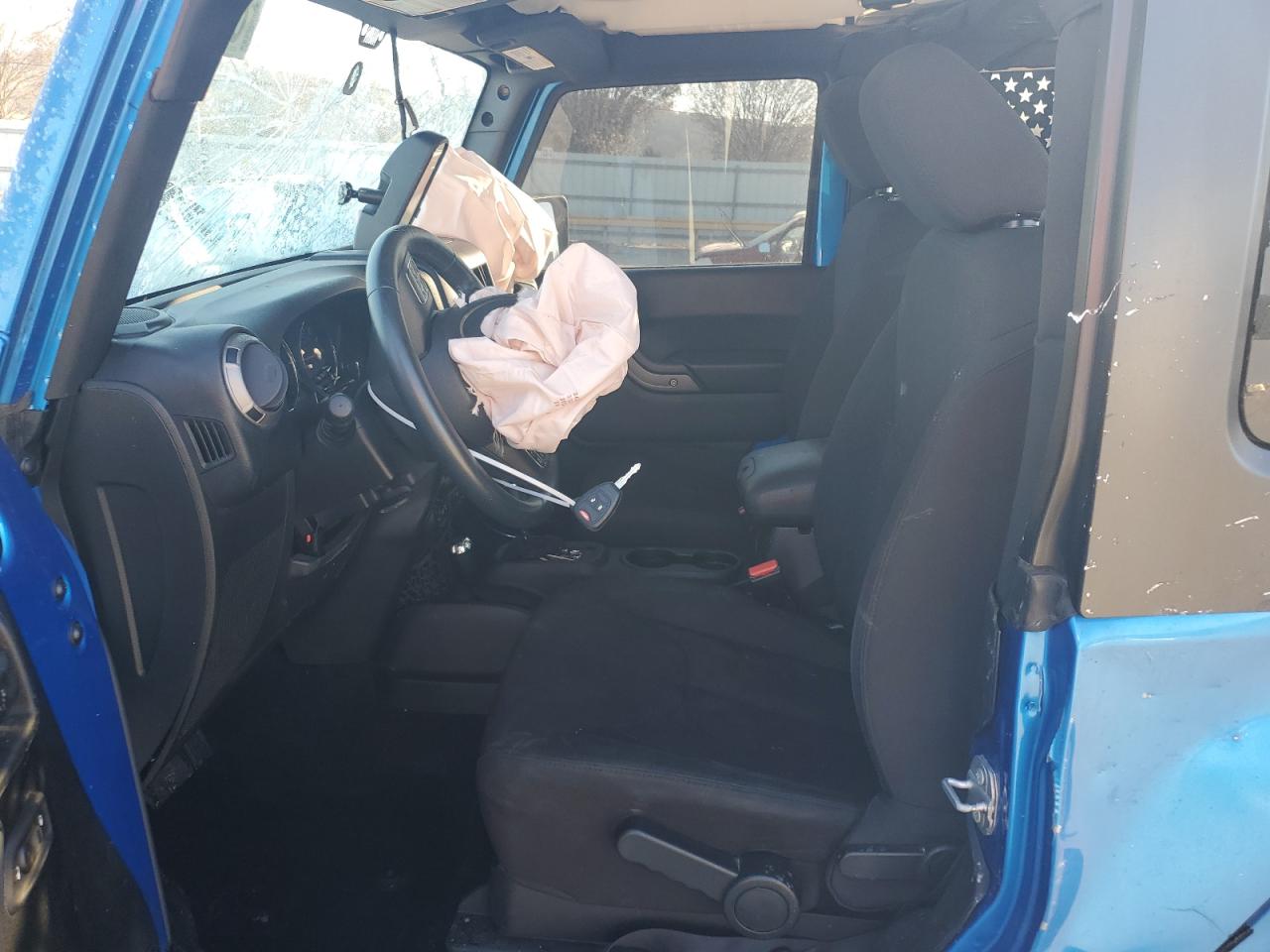 2016 Jeep Wrangler VIN 1C4AJWAG5GL218704 Copart auction photo, all over damage thumbnail 7