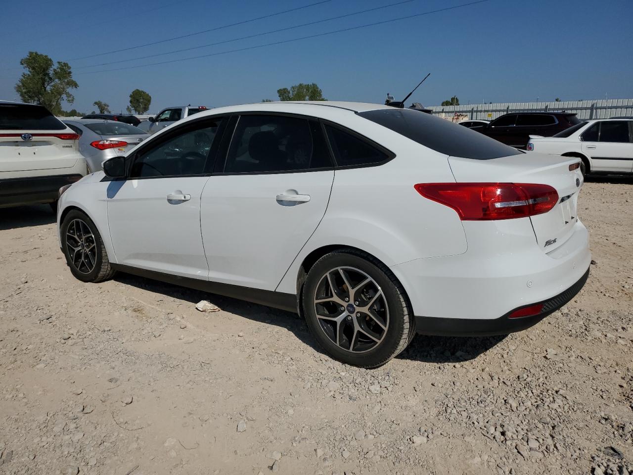 2018 Ford Focus VIN 1FADP3H27JL222805 Copart auction photo, front end / minor dent/scratches damage thumbnail 2