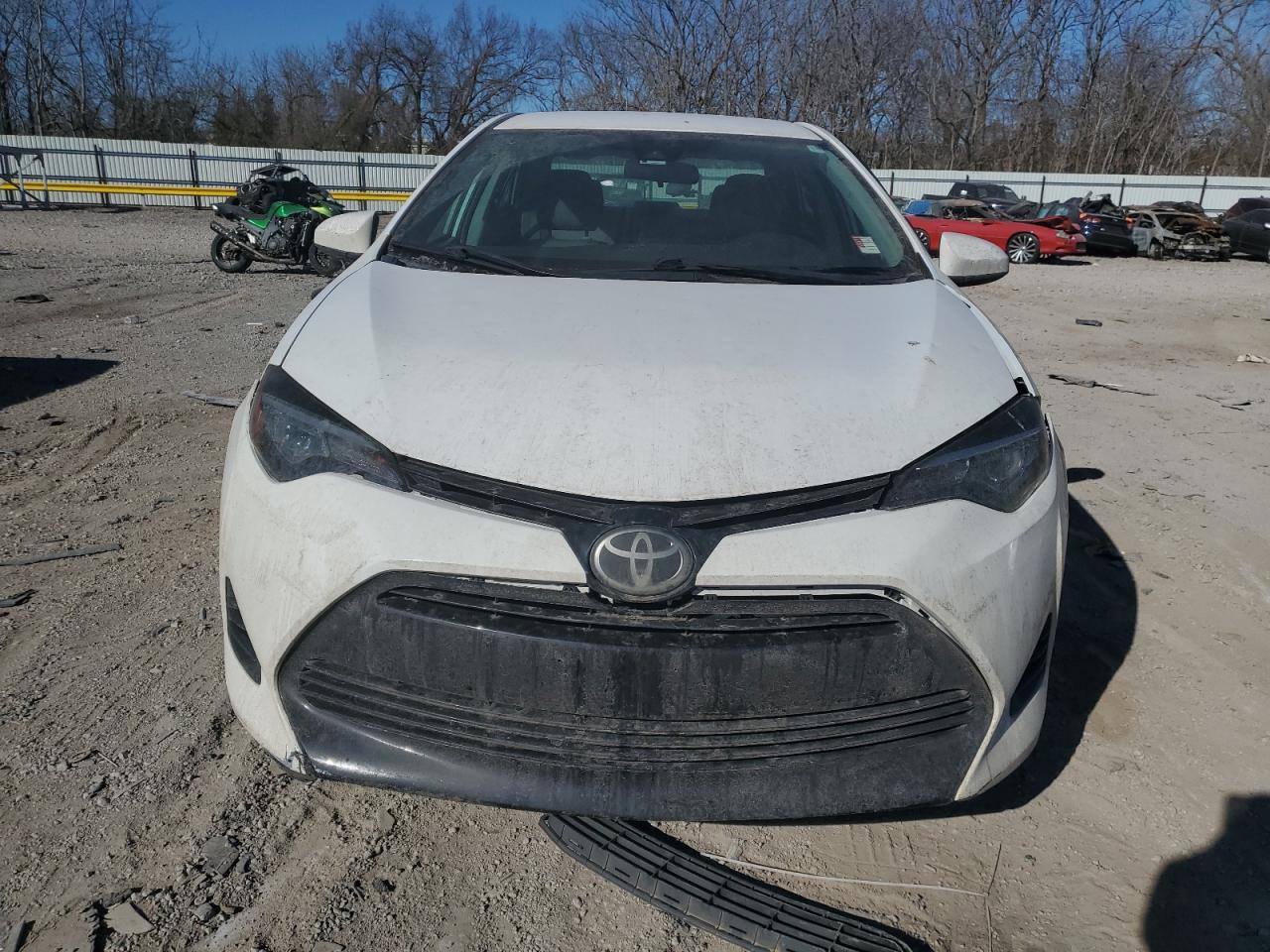 2019 Toyota Corolla VIN 5YFBURHE6KP928440 Copart auction photo, side / front end damage thumbnail 5