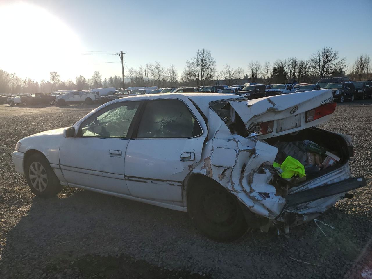 2001 Toyota Camry VIN JT2BG22K010567463 Copart auction photo, rear end / undercarriage damage thumbnail 2