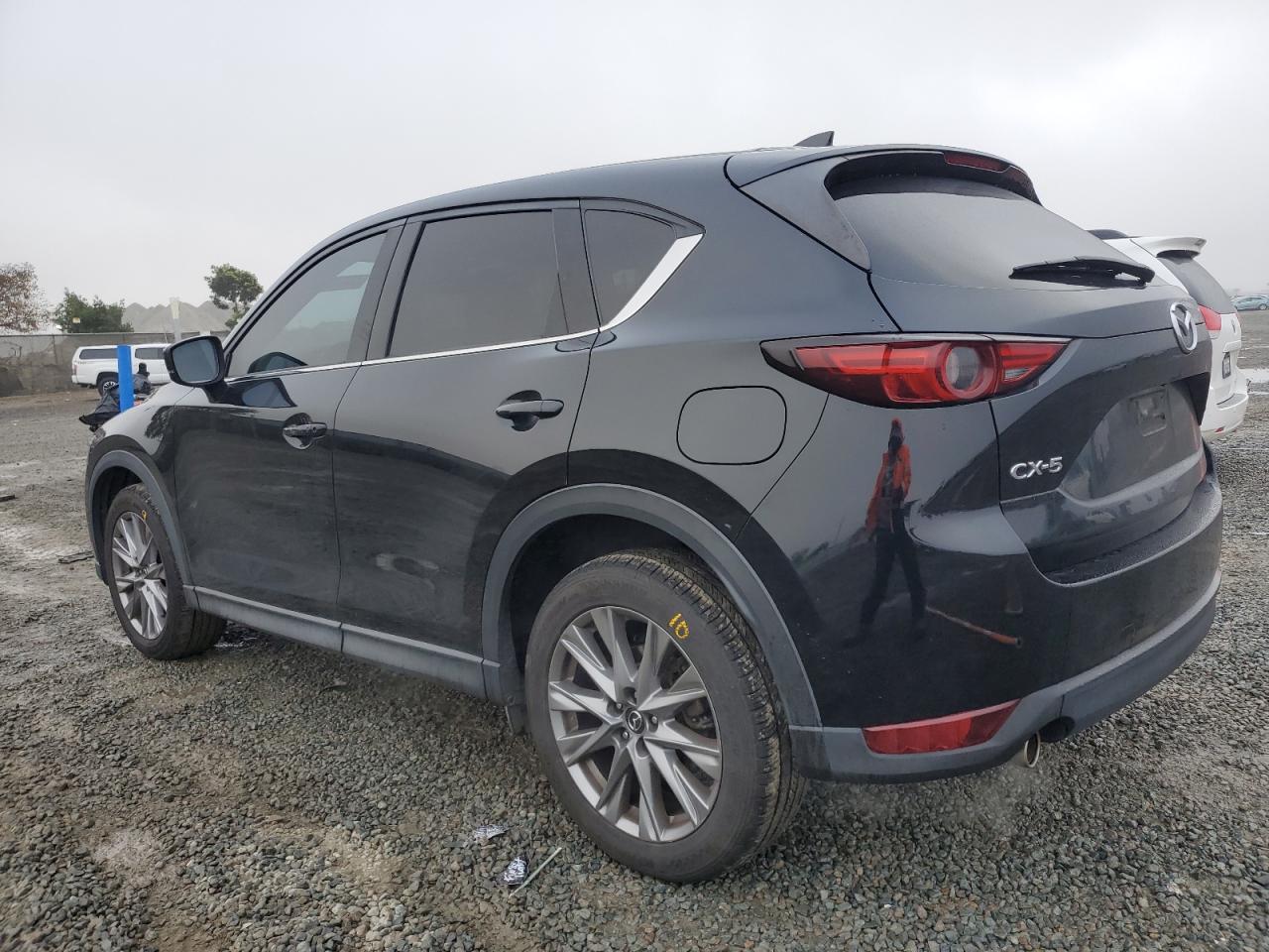 2021 Mazda CX-5 VIN JM3KFADMXM0306095 Copart auction photo, side damage thumbnail 2