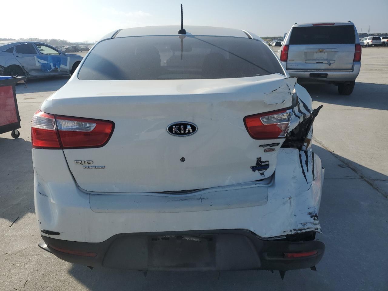 2013 KIA Rio VIN KNADM4A37D6131092 Copart auction photo, rear end / minor dent/scratches damage thumbnail 6