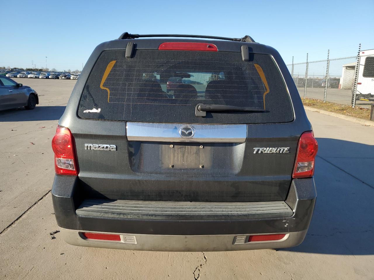 2008 Mazda Tribute VIN 4F2CZ02Z18KM04715 Copart auction photo, side / front end damage thumbnail 6