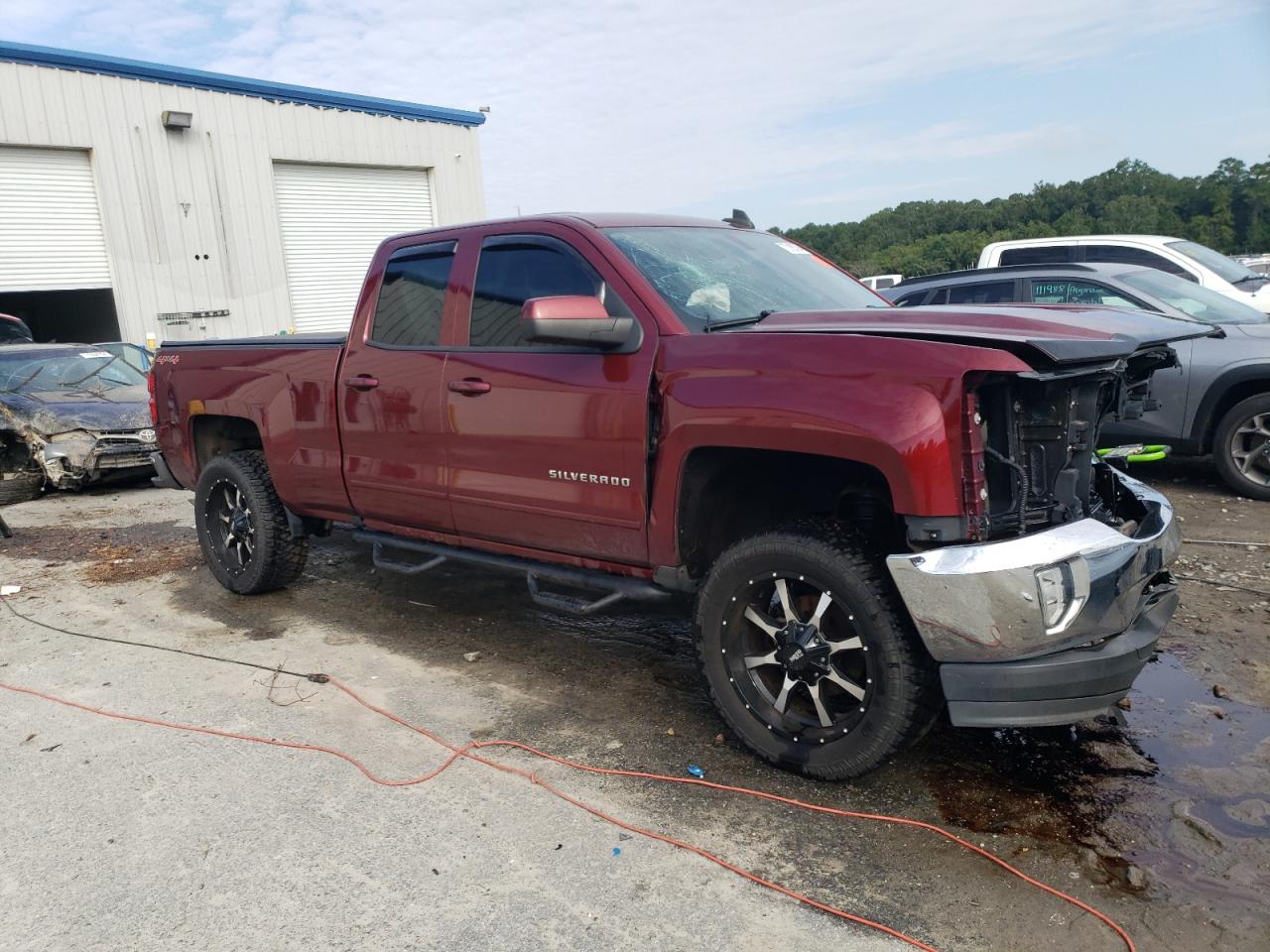 2016 Chevrolet Silverado VIN 1GCVKREC9GZ187221 Copart auction photo, front end / side damage thumbnail 4