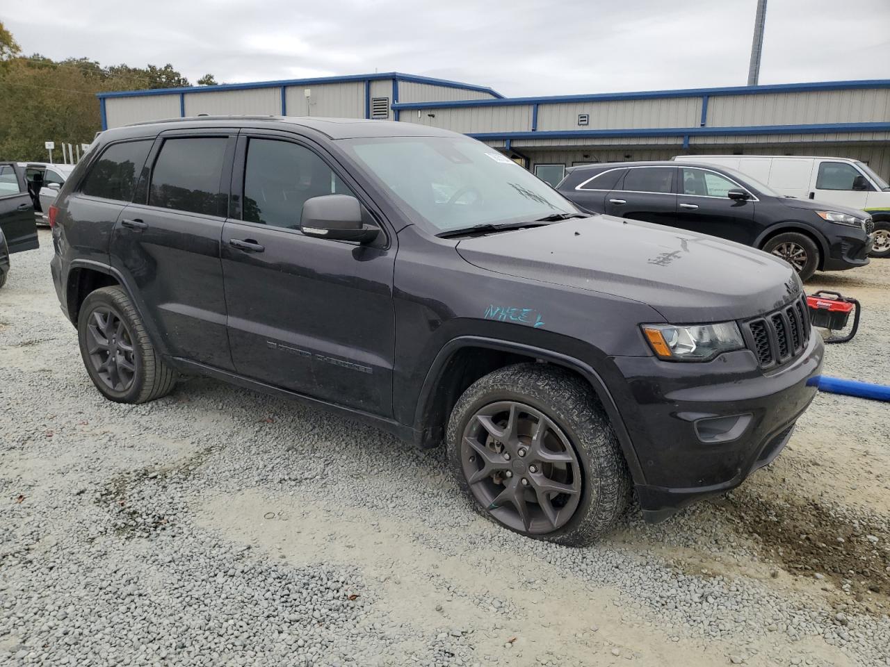 2021 Jeep Grand Cherokee VIN 1C4RJFBG0MC592408 Copart auction photo, side damage thumbnail 4