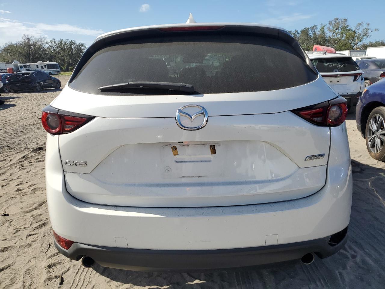 2018 Mazda CX-5 VIN JM3KFADM7J1359181 Copart auction photo, side / minor dent/scratches damage thumbnail 6