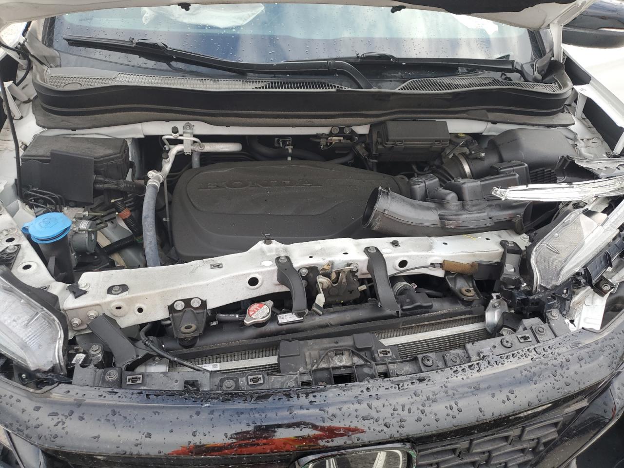 2021 Honda Passport VIN 5FNYF7H55MB007768 Copart auction photo, front end damage thumbnail 11
