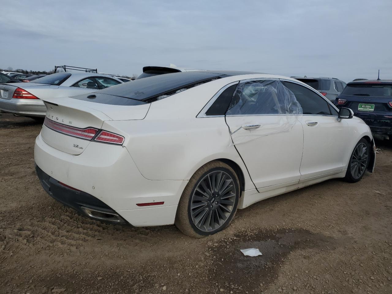 2016 Lincoln MKZ VIN 3LN6L2JK4GR600703 Copart auction photo, front end / rear end damage thumbnail 3