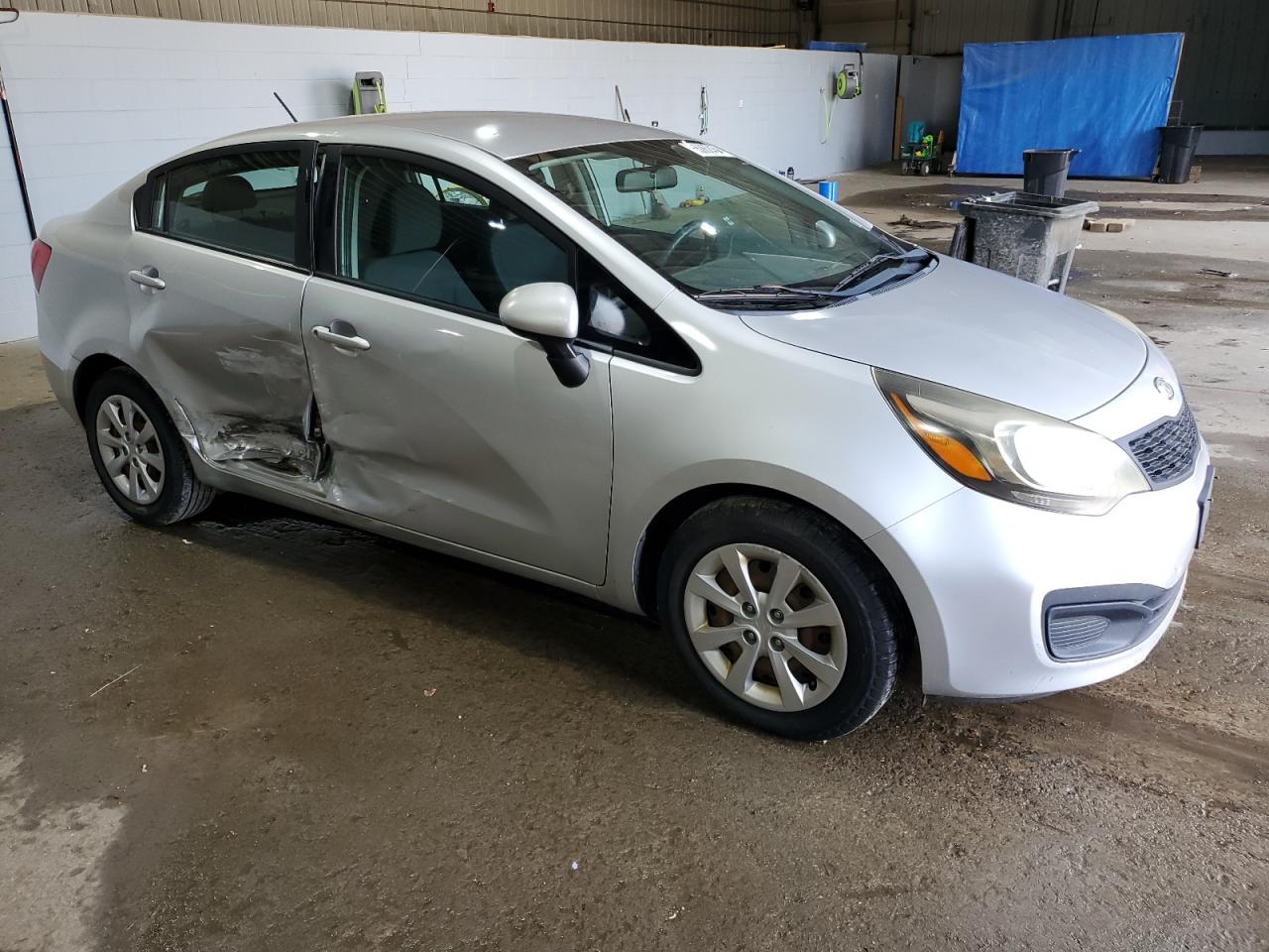 2012 KIA Rio VIN KNADM4A36C6072826 Copart auction photo, side / minor dent/scratches damage thumbnail 4