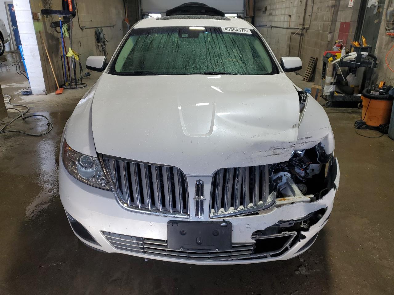 2012 Lincoln MKS VIN 1LNHL9DR2CG807649 Copart auction photo, front end / rear end damage thumbnail 5