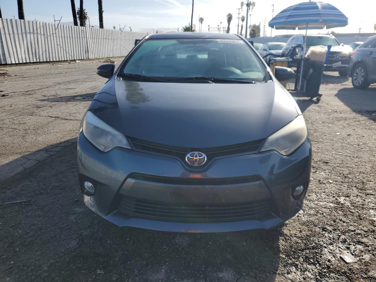 2015 Toyota Corolla VIN 5YFBURHE0FP194691 Copart auction photo, rear end / minor dent/scratches damage thumbnail 5