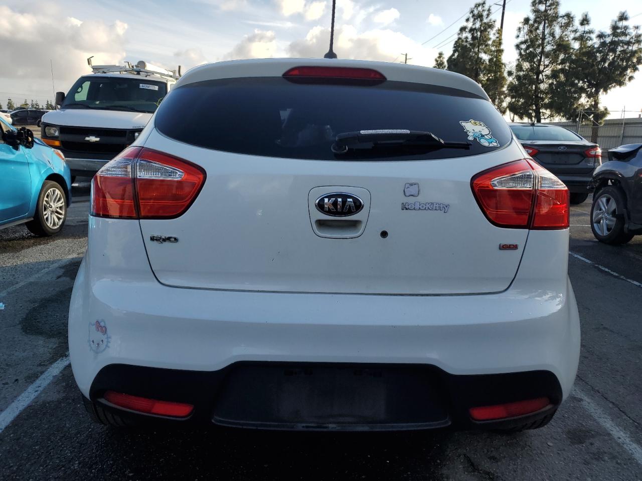 2015 KIA Rio VIN KNADM5A39F6460207 Copart auction photo, vandalism damage thumbnail 6