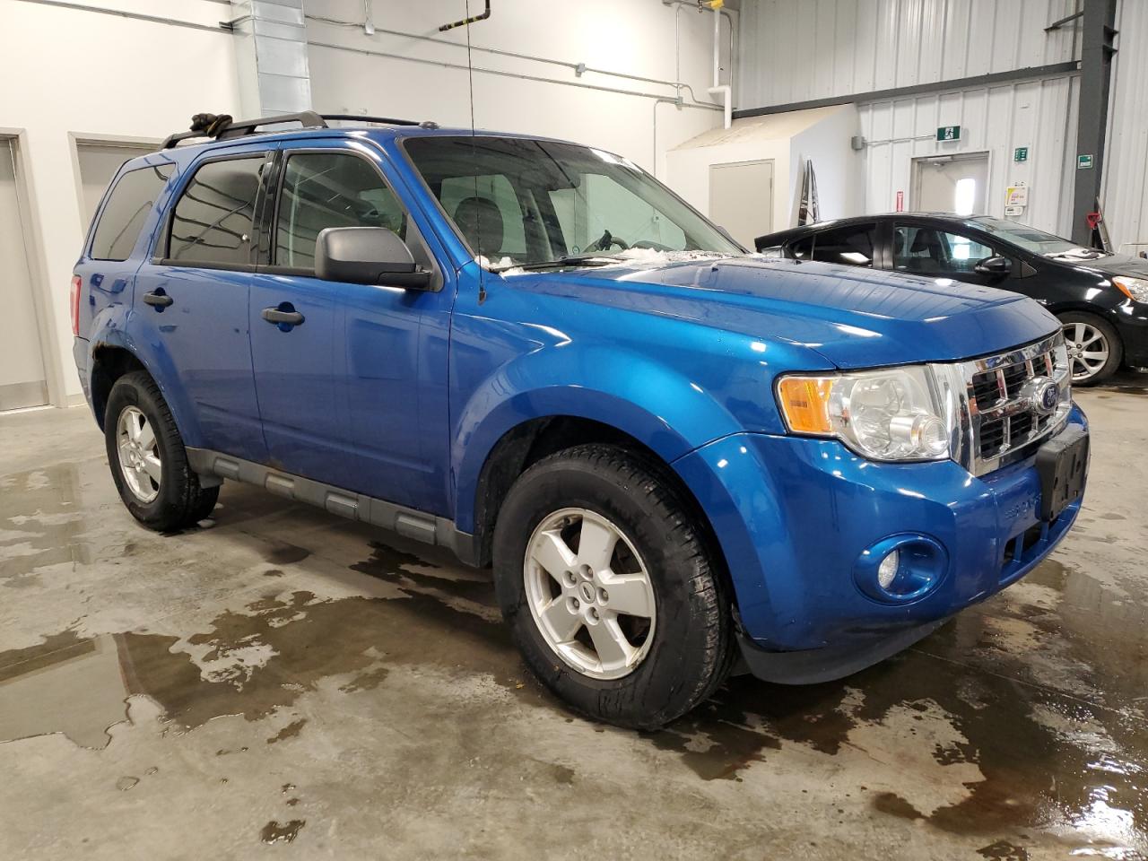 2011 Ford Escape VIN 1FMCU9DG0BKB06299 Copart auction photo, side / front end damage thumbnail 4
