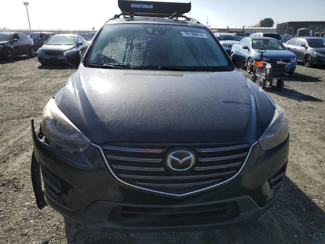 2016 Mazda CX-5 VIN JM3KE4DY4G0725667 Copart auction photo, side / front end damage thumbnail 5