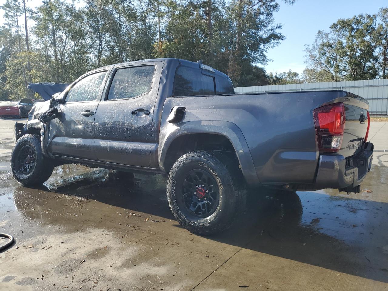 2018 Toyota Tacoma VIN 5TFAZ5CN5JX068978 Copart auction photo, rollover damage thumbnail 2