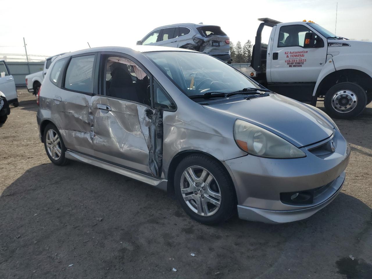 2007 Honda Fit VIN JHMGD37667S021883 Copart auction photo, side damage thumbnail 4