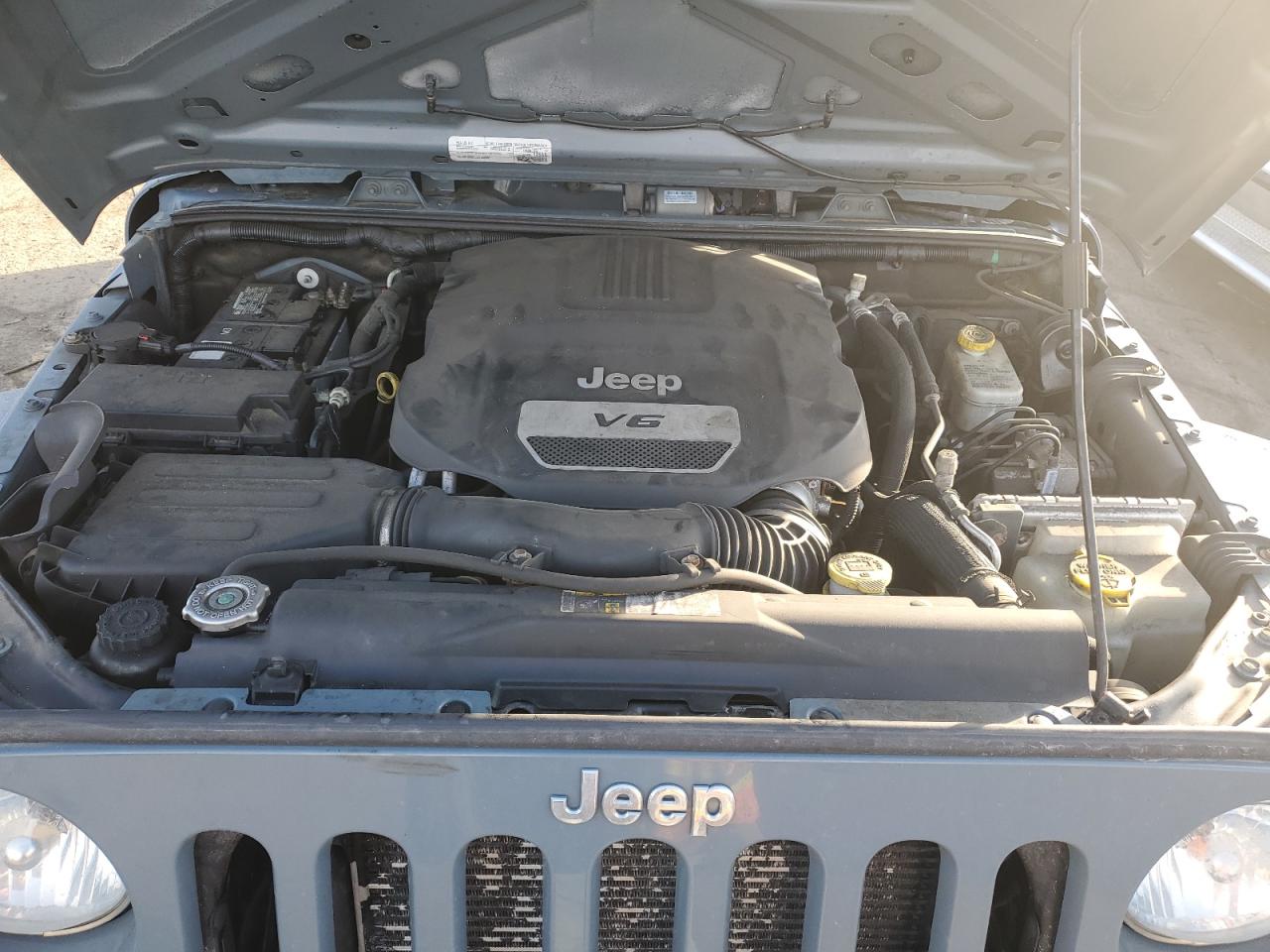2015 Jeep Wrangler VIN 1C4BJWDG7FL638656 Copart auction photo, rear end / undercarriage damage thumbnail 13
