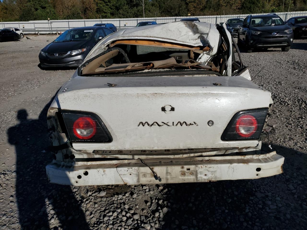 1999 Nissan Maxima VIN JN1CA21DXXM402802 Copart auction photo, all over damage thumbnail 6