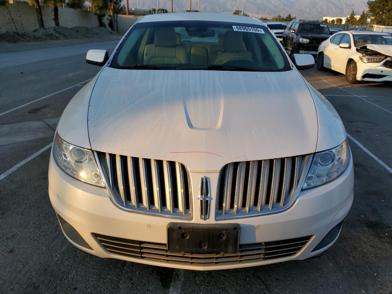 2010 Lincoln MKS VIN 1LNHL9DR1AG604619 Copart auction photo, rear end damage thumbnail 5