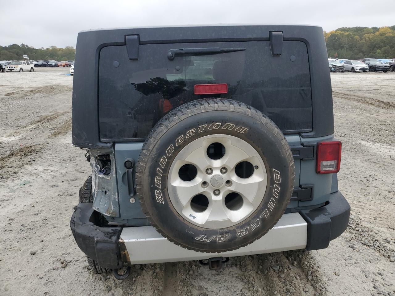 2014 Jeep Wrangler VIN 1C4HJWEG7EL109019 Copart auction photo, side / rear end damage thumbnail 6