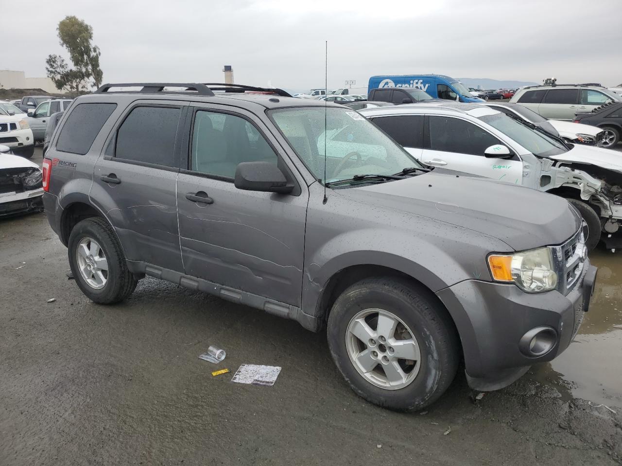 2011 Ford Escape VIN 1FMCU0D76BKA08471 Copart auction photo, side / undercarriage damage thumbnail 4