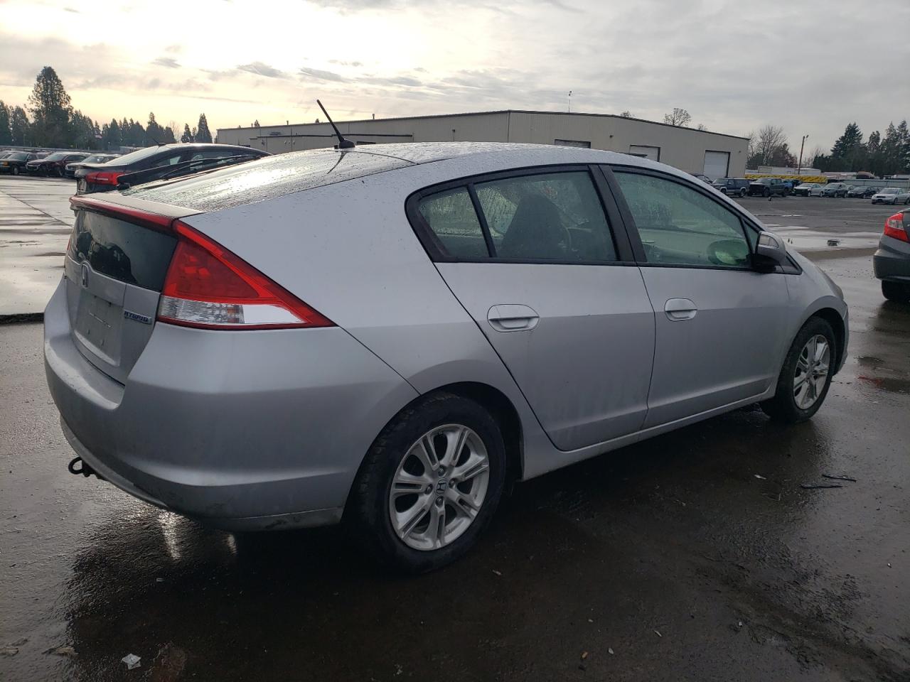 2011 Honda Insight VIN JHMZE2H74BS007268 Copart auction photo, side / rear end damage thumbnail 3