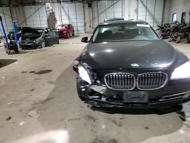 2015 BMW 7er VIN WBAYF4C55FG291706 Copart auction photo, front end damage thumbnail 12