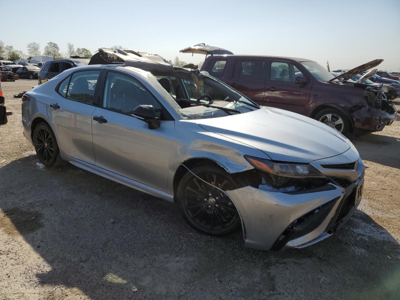 2022 Toyota Camry VIN 4T1T11AK3NU016415 Copart auction photo, rollover damage thumbnail 4