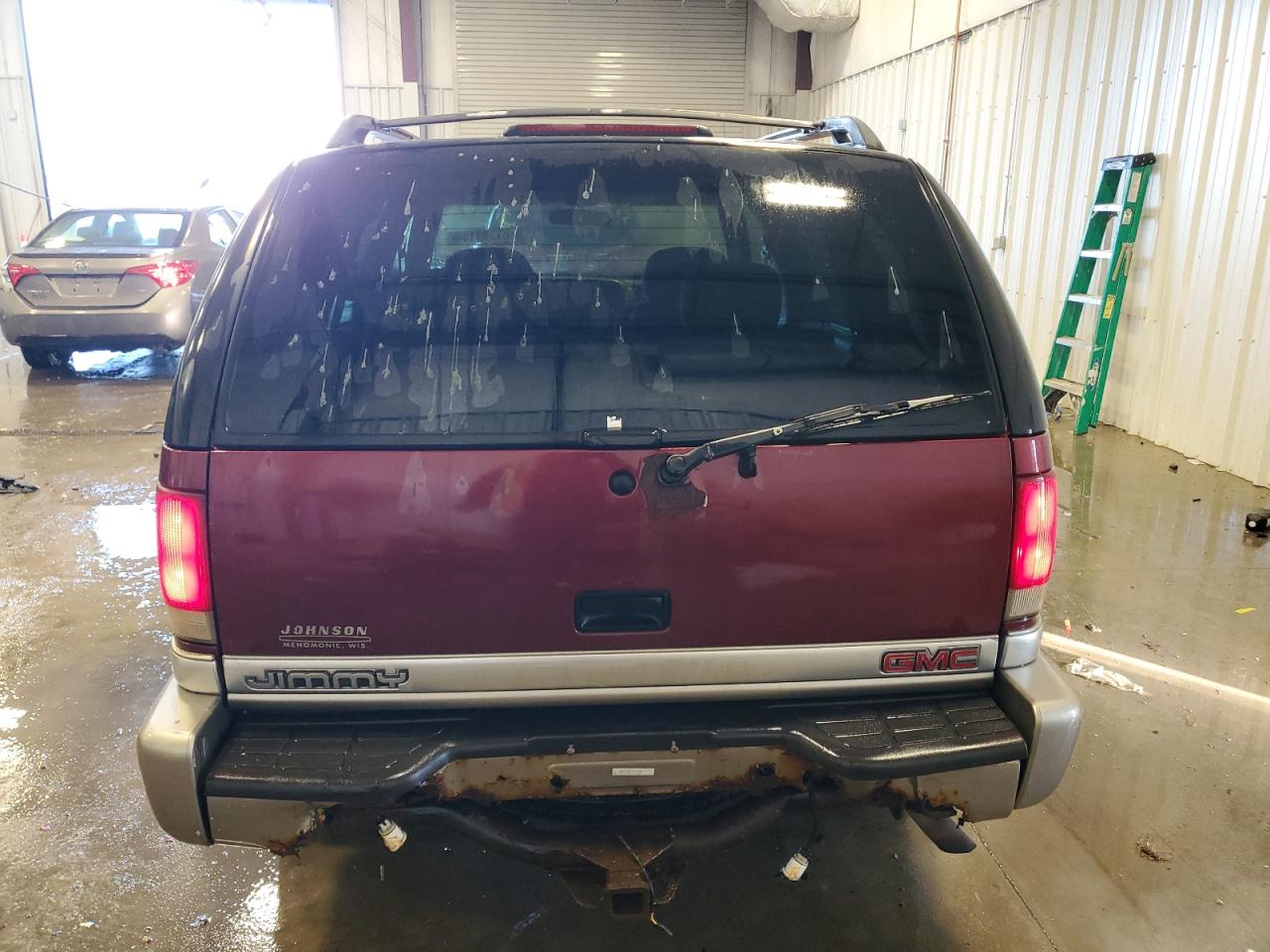 2001 GMC Jimmy VIN 1GKDT13W412139248 Copart auction photo, rear end damage thumbnail 6