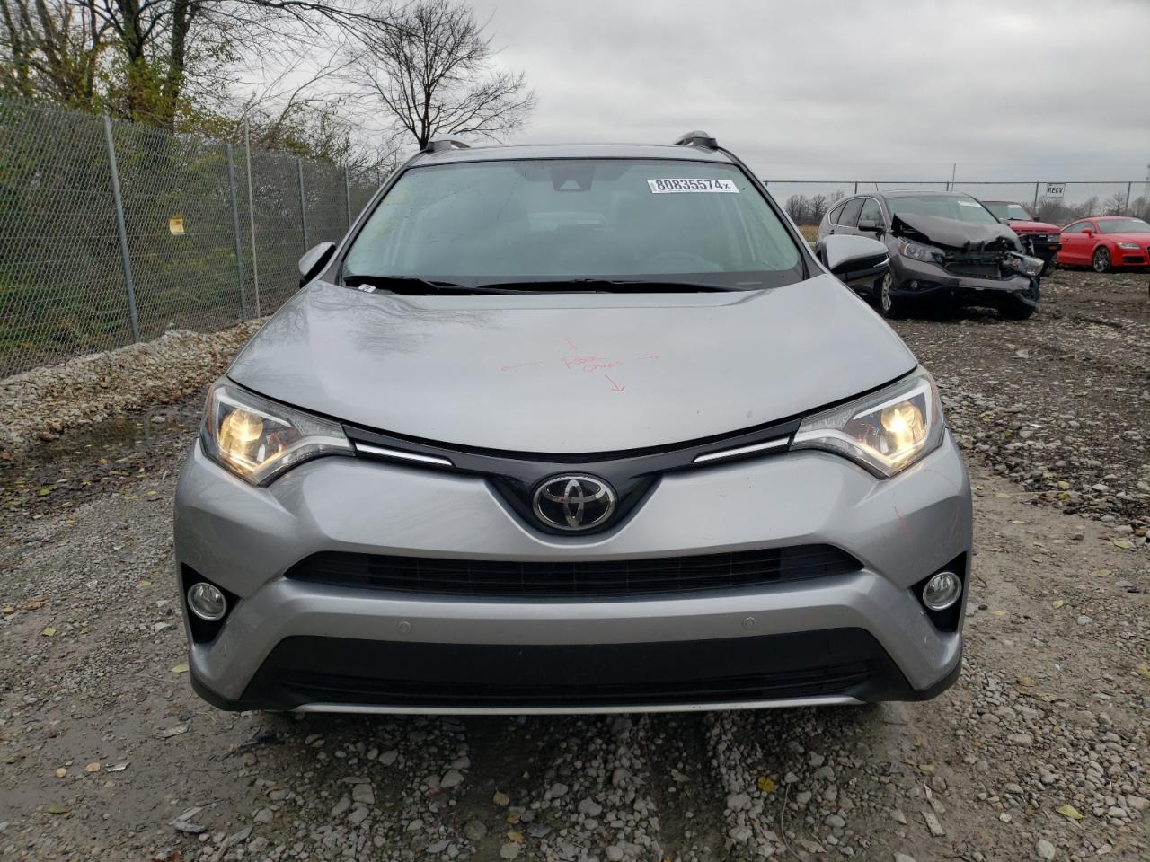 2016 Toyota RAV 4 VIN 2T3RFREV2GW471054 Copart auction photo, rear end / side damage thumbnail 5