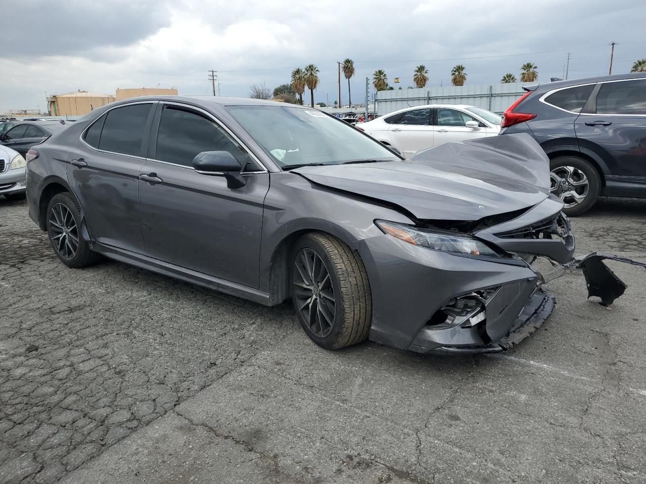 2022 Toyota Camry VIN 4T1G11AK5NU017504 Copart auction photo, front end damage thumbnail 4