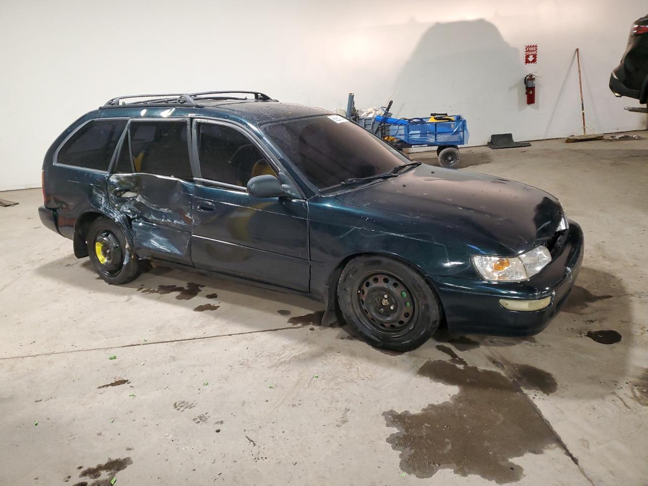 1996 Toyota Corolla VIN JT2EB02E8T0112597 Copart auction photo, side damage thumbnail 4