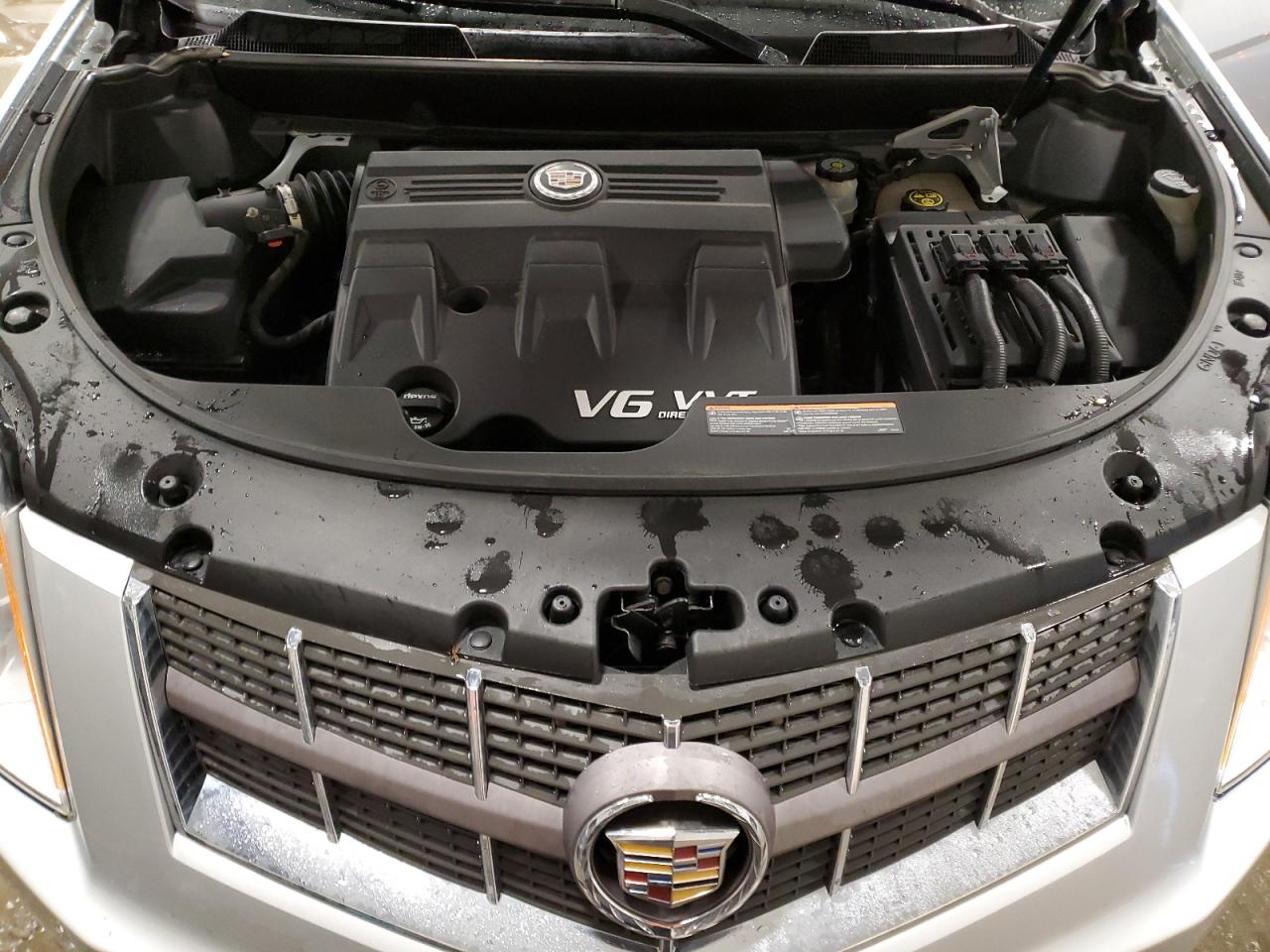 2012 Cadillac SRX VIN 3GYFNDE36CS654403 Copart auction photo, rear end damage thumbnail 12