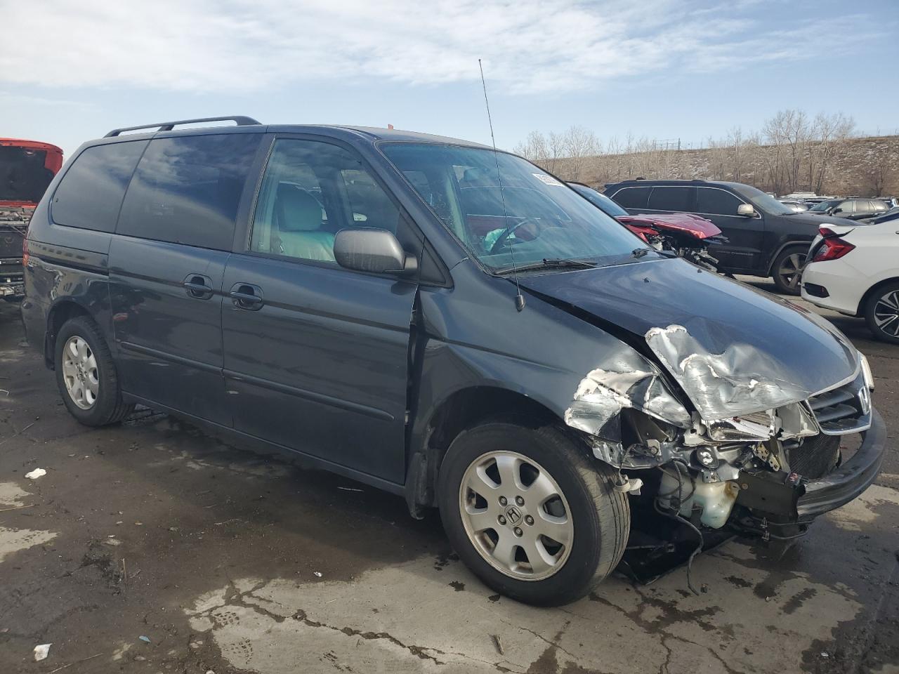 2003 Honda Odyssey VIN 5FNRL18763B158399 Copart auction photo, front end / side damage thumbnail 4