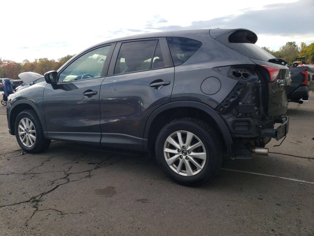 2014 Mazda CX-5 VIN JM3KE4CY4E0385502 Copart auction photo, rear end / minor dent/scratches damage thumbnail 2