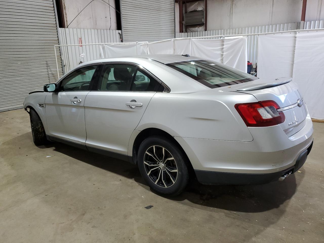 2012 Ford Taurus VIN 1FAHP2DW4CG140711 Copart auction photo, front end / side damage thumbnail 2