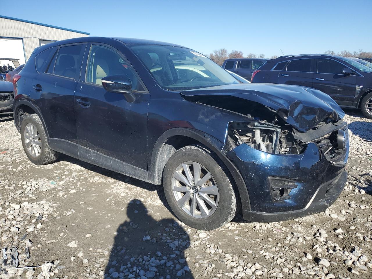2016 Mazda CX-5 VIN JM3KE4CY2G0785139 Copart auction photo, front end damage thumbnail 4