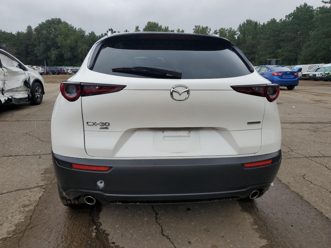 2023 Mazda CX-30 VIN 3MVDMBDM6PM516321 Copart auction photo, all over damage thumbnail 6