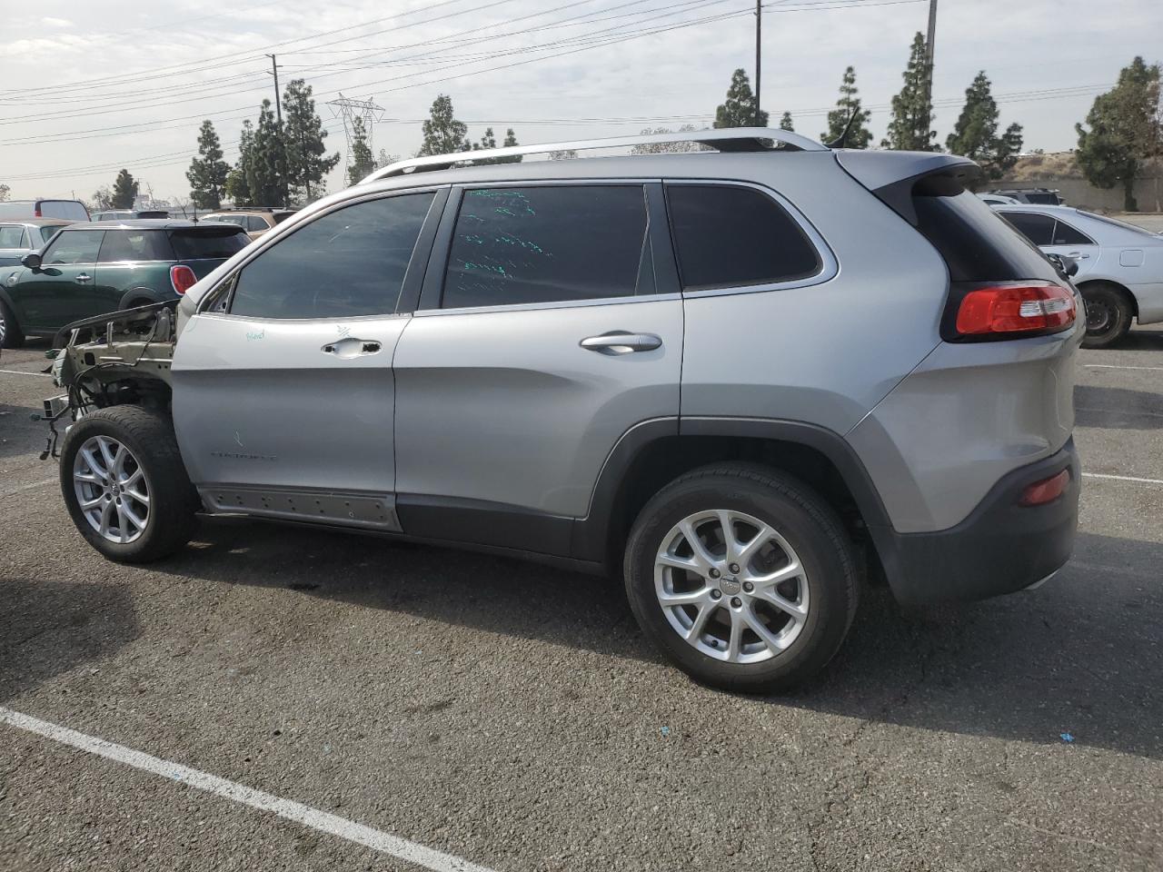 2015 Jeep Grand Cherokee VIN 1C4PJLCS1FW518506 Copart auction photo, front end / side damage thumbnail 2
