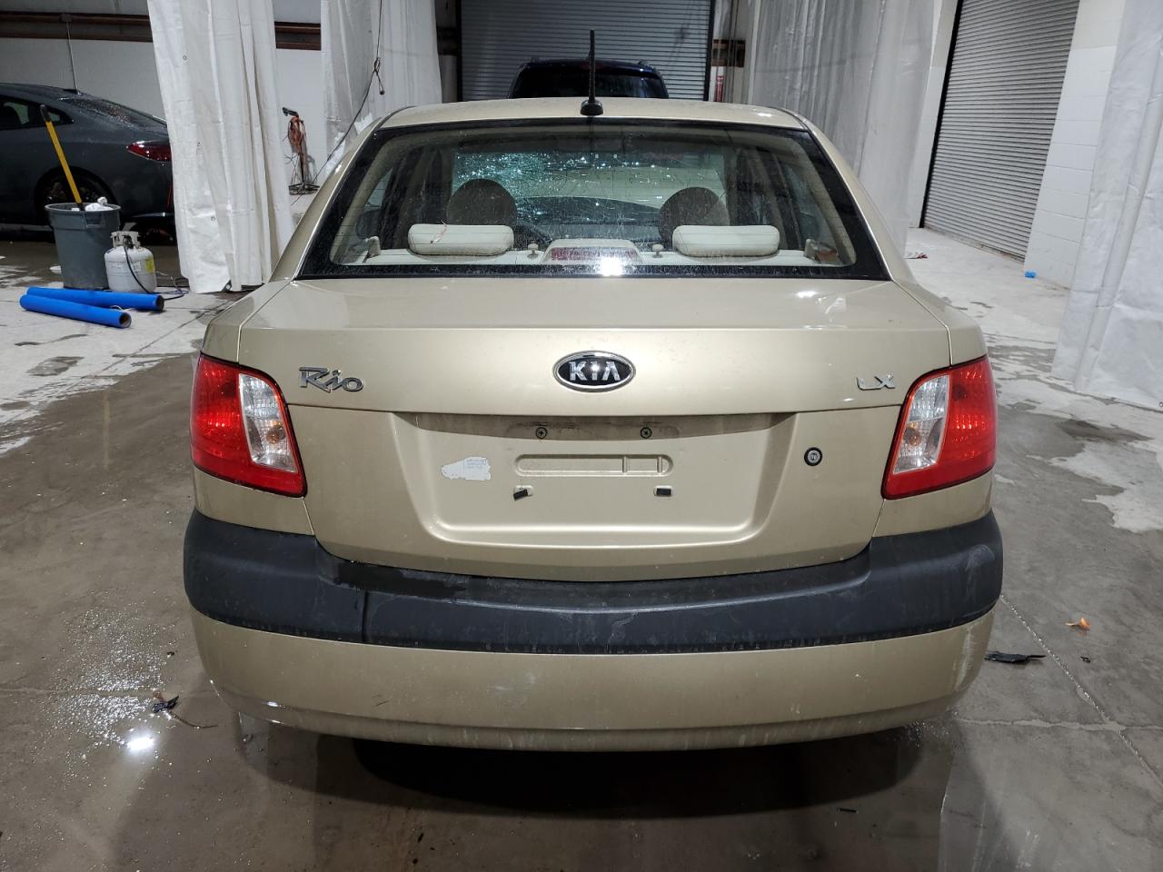 2009 KIA Rio VIN KNADE223496560262 Copart auction photo, front end damage thumbnail 6